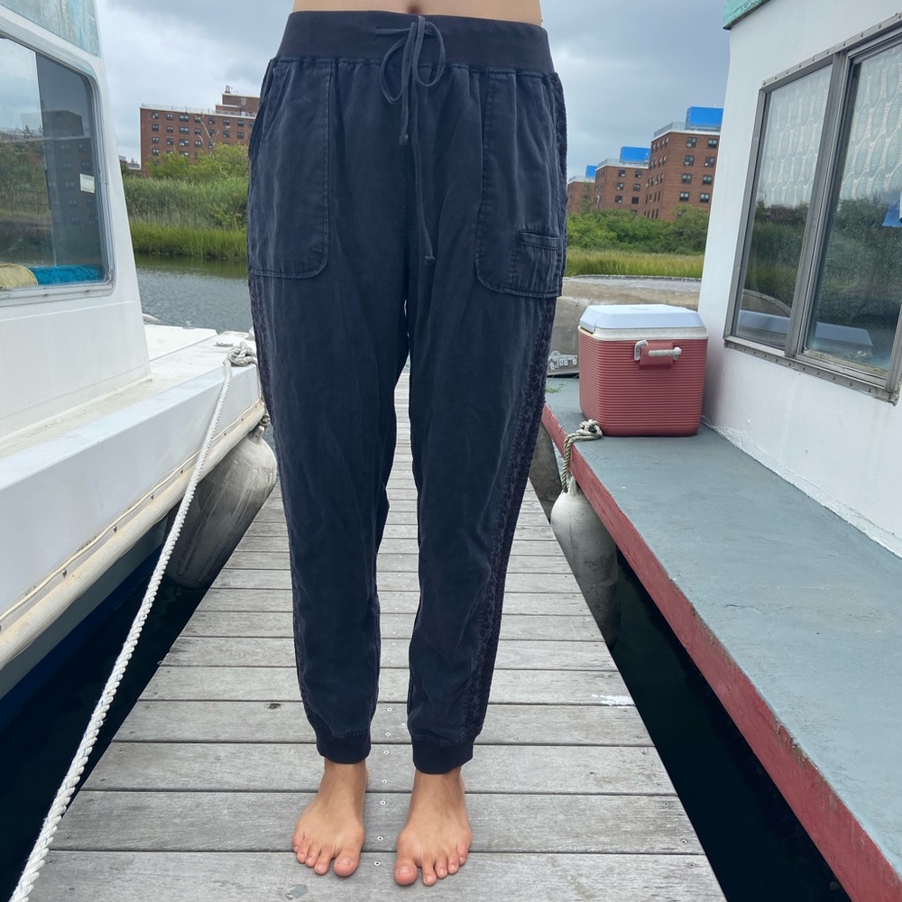 Boho Navy joggers with embroidery on the sides.